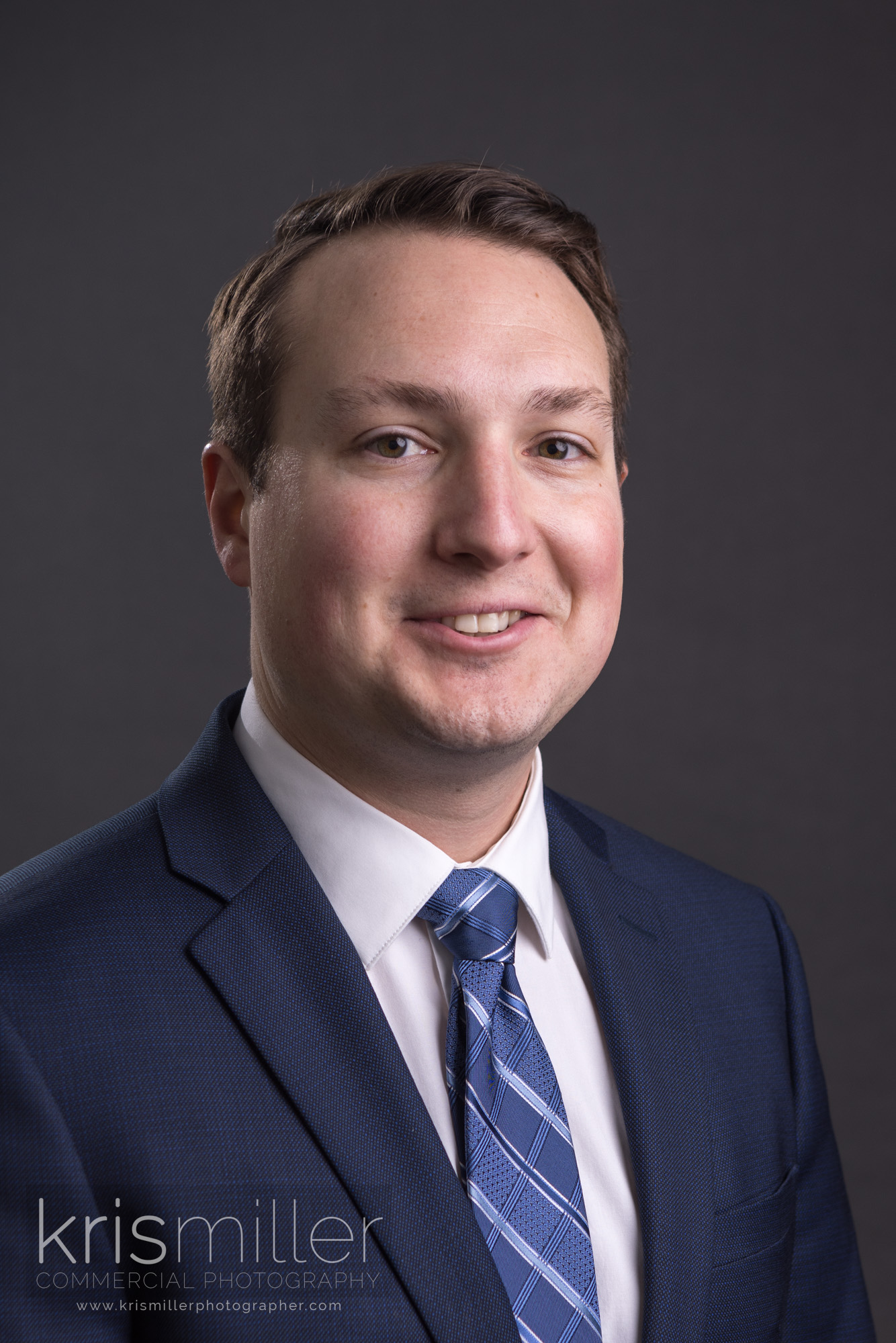 Professional headshot of a man in a suit, photographed in Columbus Ohio