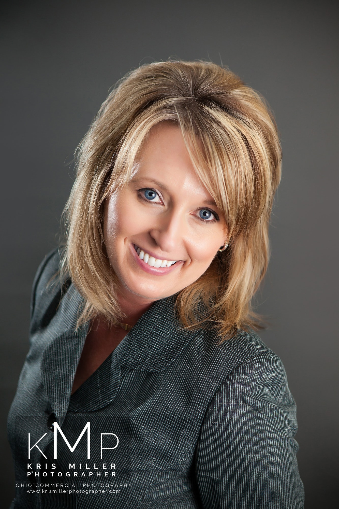 Business headshot of a smiling professional woman